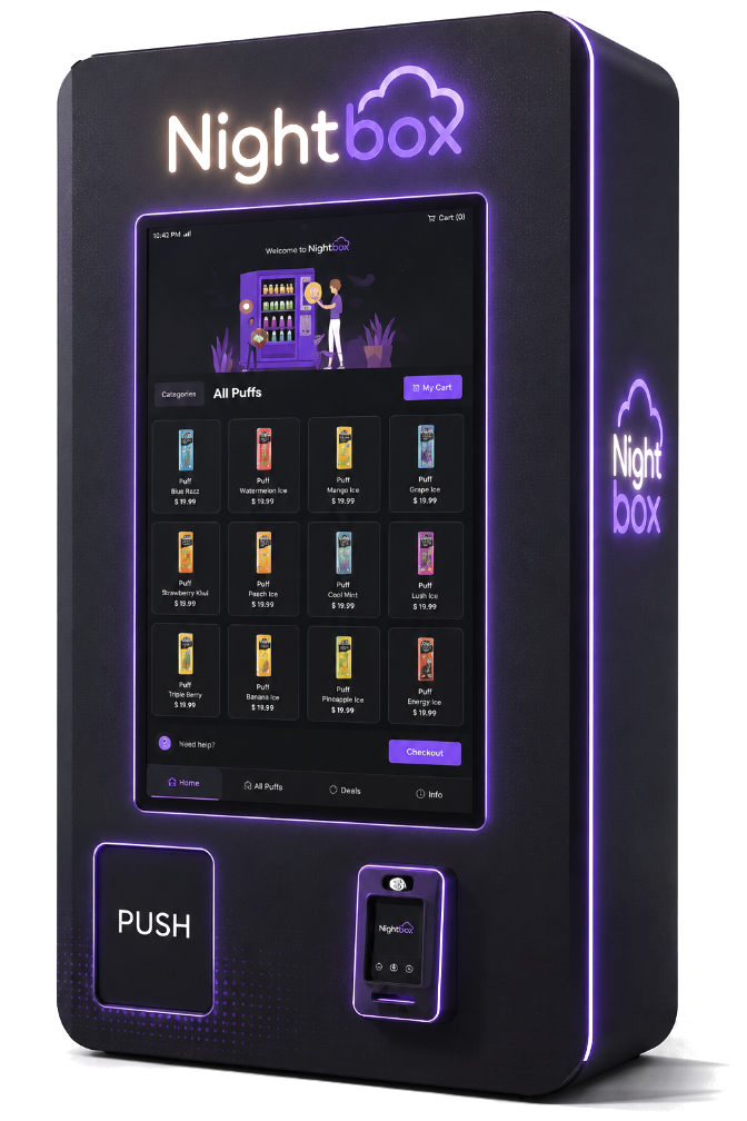 Distributeur NightBox : écran tactile de sélection, lecteur de carte bancaire et trappe de retrait.